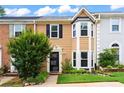 Inviting home featuring well-maintained landscaping and a classic facade at 4971 Jenny Dr, Acworth, GA 30101