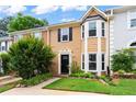 Charming home exterior with lush green lawn and neat landscaping at 4971 Jenny Dr, Acworth, GA 30101