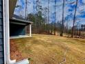 Expansive backyard with lush greenery, perfect for outdoor activities and relaxation at 5295 Greenway Dr, Villa Rica, GA 30180