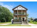 Charming two-story home featuring double front porches at 1228 Ladd Sw St, Atlanta, GA 30310
