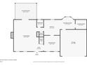 First floor plan featuring living room, kitchen, garage, dining, and screened patio at 3391 Quail Hollow Trl, Snellville, GA 30039