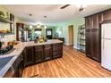 Spacious kitchen with stainless steel appliances, a large island, and ample storage space at 689 Hardin Rd, Temple, GA 30179