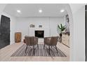 Bright living room with fireplace, contemporary decor, and open floor plan at 980 Porter Rd, Decatur, GA 30032