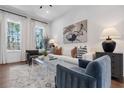Inviting living room with elegant decor, comfortable seating, and natural light at 1427 Hazy Way # 310, Atlanta, GA 30315