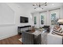 Cozy living area featuring contemporary furnishings and ample natural light at 1427 Hazy Way # 310, Atlanta, GA 30315