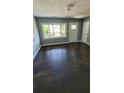 Inviting living room featuring hardwood floors and natural light at 214 Upshaw Sw St, Atlanta, GA 30315
