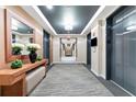 Elegant hallway with stylish decor and elevator access for convenient living at 3300 Windy Ridge Se Pkwy # 1107, Atlanta, GA 30339