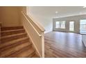 Bright living room featuring hardwood floors and a sliding glass door at 1958 Asher Ln # 50, Conyers, GA 30013