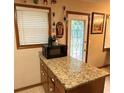 Additional view of kitchen island featuring granite countertops and stainless appliances at 2523 Bronco Trl, Duluth, GA 30096