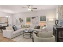 A bright living room features a comfortable sofa, neutral decor, and stylish accessories at 1023 Merritt Dr # 100, Villa Rica, GA 30180