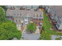 Aerial view of townhomes showing roof lines and neighborhood landscape at 2207 Concordia Se Way # 12, Mableton, GA 30126