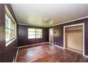 Spacious bedroom with hardwood floors, large windows, and a closet at 3179 Dogwood Dr, Atlanta, GA 30344