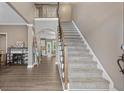 Grand two-story foyer with a staircase at 1839 Tranquil Field Nw Dr, Acworth, GA 30102