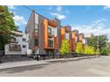 Contemporary townhome complex with modern design, featuring balconies and well-maintained landscaping at 367 Parkway Ne Dr # 9, Atlanta, GA 30312