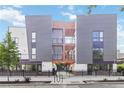Modern townhome exterior featuring a gated entrance, bicycle storage, and a sleek, contemporary facade at 367 Parkway Ne Dr # 9, Atlanta, GA 30312