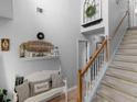 Inviting entryway features a staircase and decorative elements creating a warm and welcoming atmosphere with stylish decor at 710 Freeman Dr, Covington, GA 30016