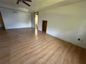Spacious living room with light wood floors and natural light, ready for your personal touches at 2715 Cordite Loop, Snellville, GA 30039
