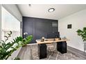 Modern home office with a large window and elegant decor at 100 Chadwick Pl, Villa Rica, GA 30180