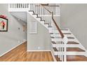 Open foyer with a staircase, blending elegance and functionality at 361 Sarah Ln, Lawrenceville, GA 30046