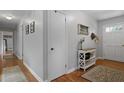 Bright hallway with hardwood floors, grey walls, modern décor and white trim at 388 Talcott Nw Cir, Marietta, GA 30064