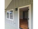 Inviting entryway showcasing hardwood floors and modern finishes, creating a warm first impression at 487 Eastside Dr, Dacula, GA 30019