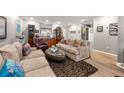 Spacious living room featuring hardwood floors, modern decor, and comfortable seating at 1141 Moorestown Cir, Decatur, GA 30033