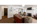 Bright living room boasts hardwood floors, stylish decor, and a cozy fireplace at 1231 Mansfield Ne Ave, Atlanta, GA 30307