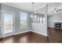 Dining area with lots of windows, deck access, and easy access to the kitchen and living room at 3313 Alhambra Cir, Hampton, GA 30228