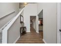Welcoming foyer with hardwood floors and staircase, leading to various rooms in the home at 4305 Chesapeake Trce, Acworth, GA 30101