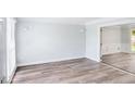 Bright living room with wood floors and glass doors at 125 Sandridge Ct, Alpharetta, GA 30022