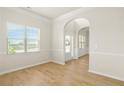 Bright living room with hardwood floors and neutral paint, a sunny and inviting space at 321 Shannon Ct, Mcdonough, GA 30252