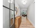 Inviting entryway with hardwood floors and a view of the living room at 3445 Henderson Dr, Cumming, GA 30041