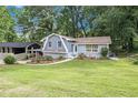 Landscaped front yard leads to an inviting home at 2950 Springfield Sw Ct, College Park, GA 30349