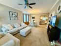 Inviting living room with open floor plan, comfortable seating, and a view of the kitchen at 2167 Del Lago Cir # 11, Kennesaw, GA 30152