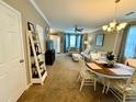 Open concept living space with dining area and a view towards the entrance and living room at 2167 Del Lago Cir # 11, Kennesaw, GA 30152