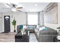 Comfortable living room with a large sectional sofa, stylish coffee table, and modern decor at 246 Aurora Nw Ave, Atlanta, GA 30314