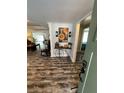 Inviting foyer with stylish decor and hardwood flooring at 2184 E Cherokee Dr, Woodstock, GA 30188