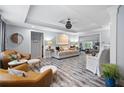 Bright living room features hardwood floors, neutral paint and modern finishes at 2184 E Cherokee Dr, Woodstock, GA 30188