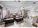Bright living room with tile flooring, plush seating, and large windows providing ample natural light at 2540 Park Ave, Austell, GA 30106