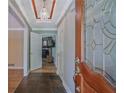 Home foyer featuring tile flooring, decorative lighting, and view of the living room at 648 Cativo Sw Dr, Atlanta, GA 30311
