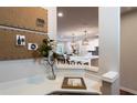 Charming office space with decor, a view into the open-concept kitchen, and lots of natural light at 306 Rockledge Sw Bnd, Powder Springs, GA 30127