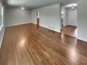 Expansive living area featuring hardwood floors and an entry view at 710 Montclair Sw Dr, Smyrna, GA 30082