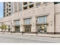 Exterior shot of building with architectural details, large windows, and prominent signage at 270 17Th Nw St # 2210, Atlanta, GA 30363