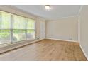 Inviting living room with natural light and new vinyl flooring at 4639 Tell Sw Rd, Atlanta, GA 30331