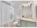 Clean bathroom with a tub, shower, and modern fixtures at 800 Peachtree Ne St # 101, Atlanta, GA 30308