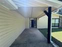 Covered entry featuring a concrete walkway leading to the front door at 120 Squirrel Way, Atlanta, GA 30349
