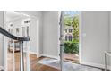 Welcoming foyer showcasing hardwood floors and a view of the exterior at 3532 Paces Nw Pl, Atlanta, GA 30327