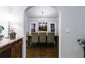 Elegant dining room with hardwood floors, chandelier, and view to outside at 1146 Cumberland Ne Rd, Atlanta, GA 30306