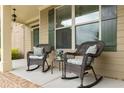 Inviting front porch with comfortable rocking chairs, perfect for relaxing outdoors at 200 Glenview Ct, Woodstock, GA 30188