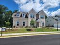 Attractive two-story house showcasing a well-manicured lawn and elegant architectural details at 2949 Longbush, Duluth, GA 30097